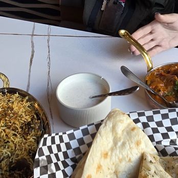 Tamarind Tales - Upper right is Tandoori Tikka Masala. Bottom is Naan(plain & Garlic) - Indian Near Me - Vancouver, British Columbia Tamarind Tales - Upper right is Tandoori Tikka Masala. Bottom is Naan(plain & Garlic) - Indian Near Me - Vancouver, British Columbia