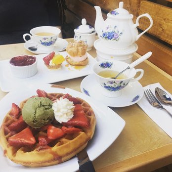 Prince Tea House - Strawberry waffle with a scoop of green tea ice cream, trio combination dessert and a pot of cherry blossom tasting green tea! - Desserts Near Me - Brooklyn, New York Prince Tea House - Strawberry waffle with a scoop of green tea ice cream, trio combination dessert and a pot of cherry blossom tasting green tea! - Desserts Near Me - Brooklyn, New York