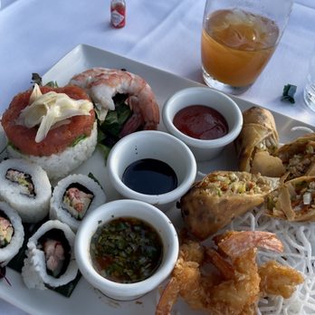 Peohe's - Shrimp Cocktail Coconut Crunchy Shrimp Lobster & Shrimp Roll Ahi Tuna Stack and Thai Chicken Spring Rolls - Seafood Near Me - Coronado, California Peohe's - Shrimp Cocktail Coconut Crunchy Shrimp Lobster & Shrimp Roll Ahi Tuna Stack and Thai Chicken Spring Rolls - Seafood Near Me - Coronado, California