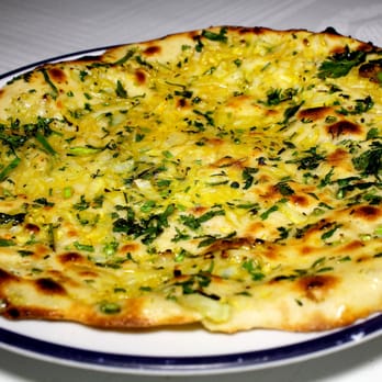 Ganges - Nuestro pan de cebolla, cilantro y cúrcuma, ¡delicioso! - Indian Near Me - Madrid, M Ganges - Nuestro pan de cebolla, cilantro y cúrcuma, ¡delicioso! - Indian Near Me - Madrid, M