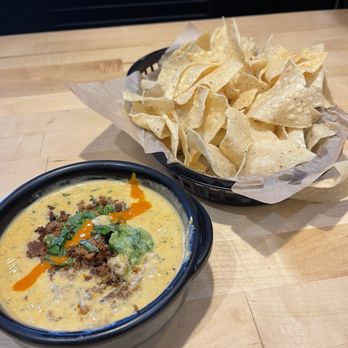 Torchy's Tacos - Hillbilly Queso with choriza and avocado - Tex-Mex Near Me - Dallas, Texas