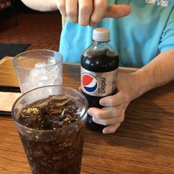 Pizza Hut - We both got Diet Pepsi...mine was just served normally, hubby's got ice and a drink...strange