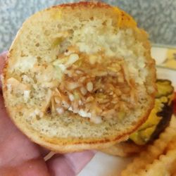 Randy's Restaurant - This is all they put one a over microwaved bun , this is supposed to be Slaw, onion, and mayo! What a joke.