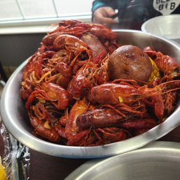 a bowl of craws and potatoes