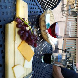 cheese board, glass sangria wine, and pint of Canadian stout. cheese board, glass sangria wine, and pint of Canadian stout.