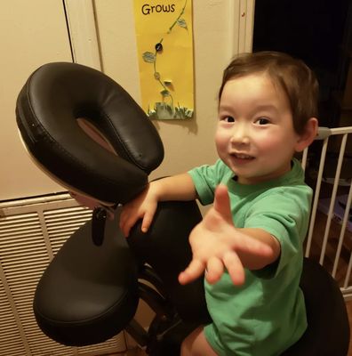 Chair Massage Outcall - Before every appointment, I inspect my equipment. Occasionally I have help!