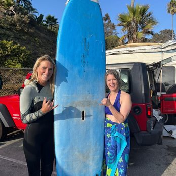 Wavehuggers - Cady and I post lesson - a happy surfer! - Surf Schools Near Me - Huntington Beach, California Wavehuggers - Cady and I post lesson - a happy surfer! - Surf Schools Near Me - Huntington Beach, California