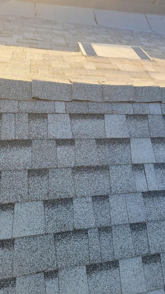 Slide of Universal Roofing