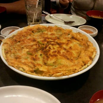 Yechon - Seafood pancake with a side of spicy soy sauce - Korean Near Me - Annandale, Virginia Yechon - Seafood pancake with a side of spicy soy sauce - Korean Near Me - Annandale, Virginia