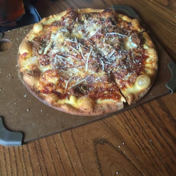 Taverna Rossa - Smokey pie doused in parmesan cheese. - Pizza Near Me - Plano, Texas