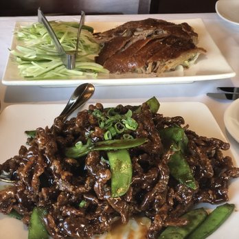 Jimmy Wan's - Crispy beef w added snow peas. Half Peking duck in the background. - Chinese Near Me - Cranberry Twp, Pennsylvania Jimmy Wan's - Crispy beef w added snow peas. Half Peking duck in the background. - Chinese Near Me - Cranberry Twp, Pennsylvania
