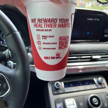 Smoothie King - a hand holding a cup of coffee - Health Markets Near Me - Tampa, Florida Smoothie King - a hand holding a cup of coffee - Health Markets Near Me - Tampa, Florida