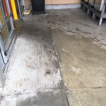 The Home Depot - These rough textured slabs right in front of the doors are quite slip resistant. - Hardware Stores Near Me - Bellevue, Washington The Home Depot - These rough textured slabs right in front of the doors are quite slip resistant. - Hardware Stores Near Me - Bellevue, Washington