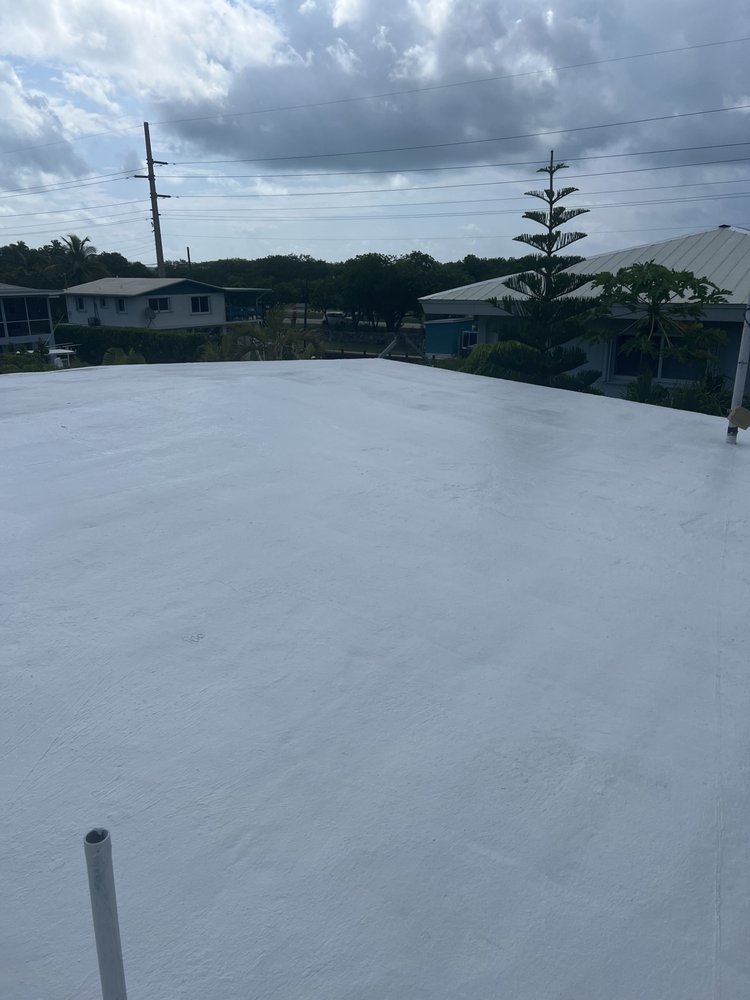 Slide of Andy The Roofer & Co