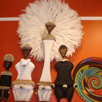 Folklorico - Domji dolls from Cameroon, Juju feather headdress, Zulu telephone wire platter - Home Decor Near Me - Savannah, Georgia