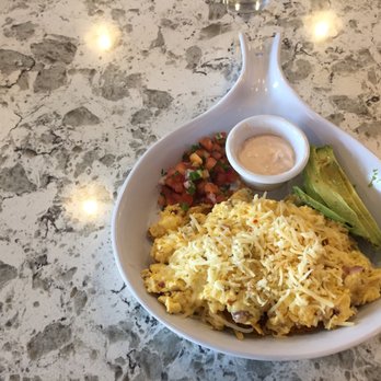 Ruby Slipper Uptown - Migas. Scrambled eggs over tortilla chips. - Cafes Near Me - New Orleans, Louisiana Ruby Slipper Uptown - Migas. Scrambled eggs over tortilla chips. - Cafes Near Me - New Orleans, Louisiana