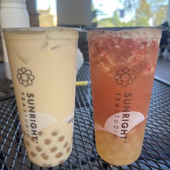 Sunright Tea Studio - White Peach Oolong Milk Tea (Left) & Strawberry Jasmine Tea (Right) w/ Honey Boba & 75% Sweet - Bubble Tea Near Me - Irvine, California Sunright Tea Studio - White Peach Oolong Milk Tea (Left) & Strawberry Jasmine Tea (Right) w/ Honey Boba & 75% Sweet - Bubble Tea Near Me - Irvine, California