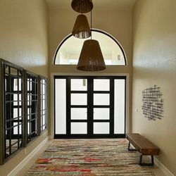 Florida Impact Windows & Doors - Custom entry door with a half circle above! #floridaimpactwindowsanddoors #category5 #browardcounty #onlyindade #palmbeach #westpalmbeach
