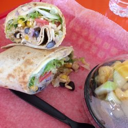 Tropical Smoothie Cafe - Hummus veggie wrap with a side of fruit
