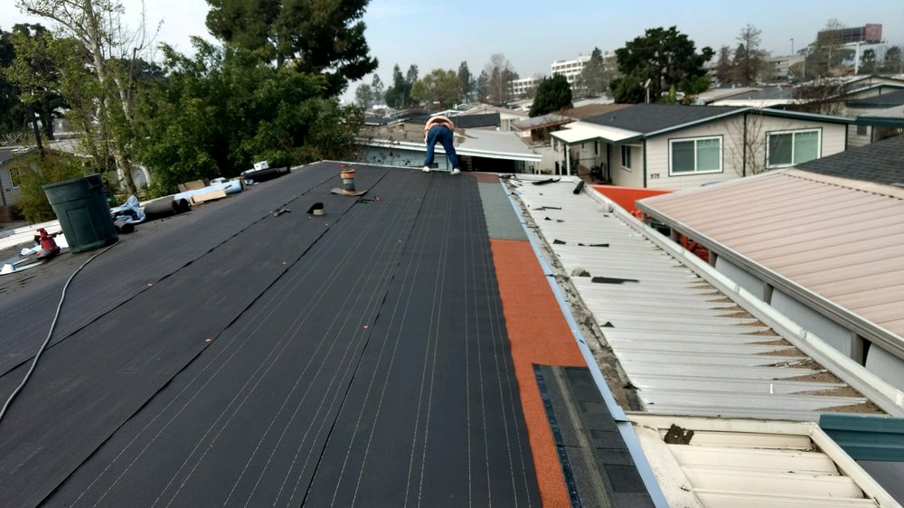 Slide of Magic Hands Roofing