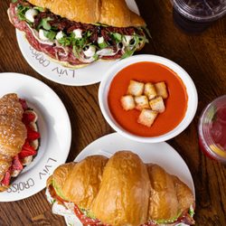 Lviv Croissants - Our large Italian Charcuterie and Turkey Avocado BLT Croissants, a sweet Strawberry Banana & Nutella Croissant, soup, and drinks.