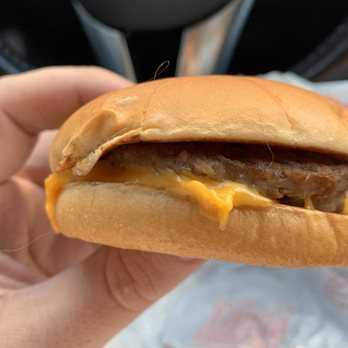 McDonald's - You can see the hair hanging out on the left curls out to the top and back out again on the front - Fast Food Near Me - Tampa, Florida McDonald's - You can see the hair hanging out on the left curls out to the top and back out again on the front - Fast Food Near Me - Tampa, Florida