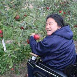 Shangri-La Too Farm - Me apple picking from my wheelchair!