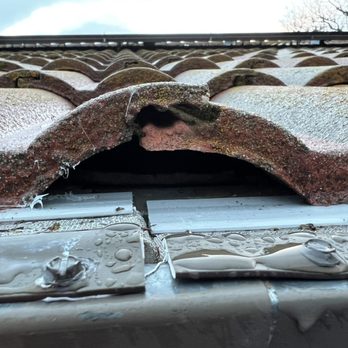 LeafFilter Gutter Protection - Tech smashed the guard into place and separated the tiles in this section - Gutter Services Near Me - Stockton, California