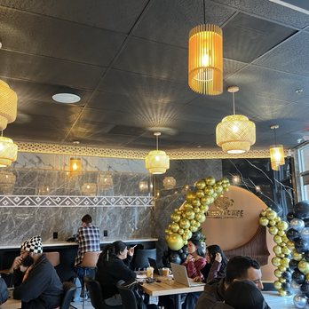 Sana'a Cafe - Interior tables + high top seating against the wall - Coffee & Tea Near Me - Elk Grove, California Sana'a Cafe - Interior tables + high top seating against the wall - Coffee & Tea Near Me - Elk Grove, California