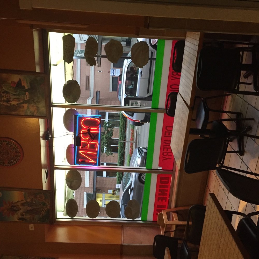 Mr. Salsa - a view of a restaurant through a window - Mexican Near Me - Chicago, Illinois Mr. Salsa - a view of a restaurant through a window - Mexican Near Me - Chicago, Illinois
