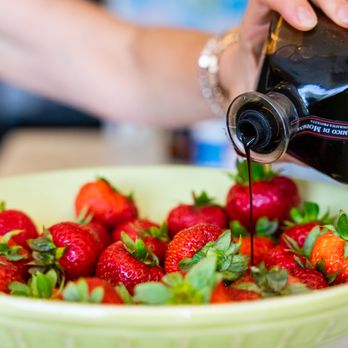 Olio2go - a bowl of strawberries being drizzled - Olive Oil Near Me - Fairfax, Virginia