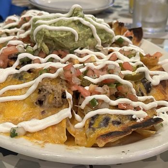 Mekiko Cantina - Kalua Pork Nachos. Loved the slight char on some of the chips. Not spicy. - Tacos Near Me - Kapolei, Hawaii Mekiko Cantina - Kalua Pork Nachos. Loved the slight char on some of the chips. Not spicy. - Tacos Near Me - Kapolei, Hawaii