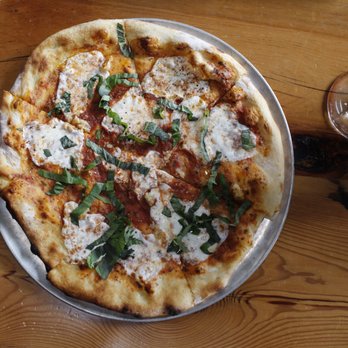 Barnone - Margherita pizza from Fire & Brimstone, I had them add fresh garlic and have zero regrets. Hand tossed thin crust, baked to perfection - Arts & Crafts Near Me - Gilbert, Arizona