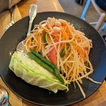 Kati Vegan Thai - Papaya salad with quarter raw cabbage - Thai Near Me - Seattle, Washington Kati Vegan Thai - Papaya salad with quarter raw cabbage - Thai Near Me - Seattle, Washington