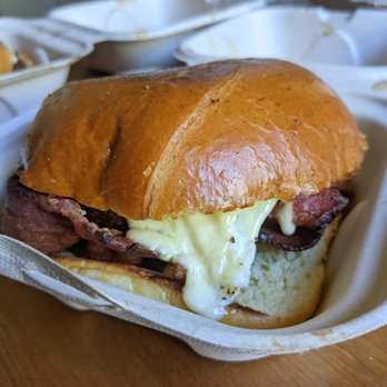 Egghole - Friends with Benedicts: smoked bacon, local cage free runny egg scratch hollandaise served in a toasted brioche bun - Breakfast & Brunch Near Me - Kent, Washington Egghole - Friends with Benedicts: smoked bacon, local cage free runny egg scratch hollandaise served in a toasted brioche bun - Breakfast & Brunch Near Me - Kent, Washington