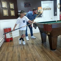 Clifton’s On Main - Styling with a haircut and game of pool