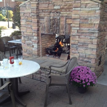 Afton Tavern - Outdoor patio and fire place - American Near Me - Concord, North Carolina