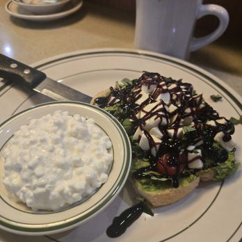 Woody's Diner - Caprese Avocado Toast with cottage cheese and a nice strong cup of coffee - Diners Near Me - Newport Beach, California Woody's Diner - Caprese Avocado Toast with cottage cheese and a nice strong cup of coffee - Diners Near Me - Newport Beach, California