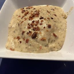 Biscuits and gravy appetizer. One biscuit. Delicious. Biscuits and gravy appetizer. One biscuit. Delicious.