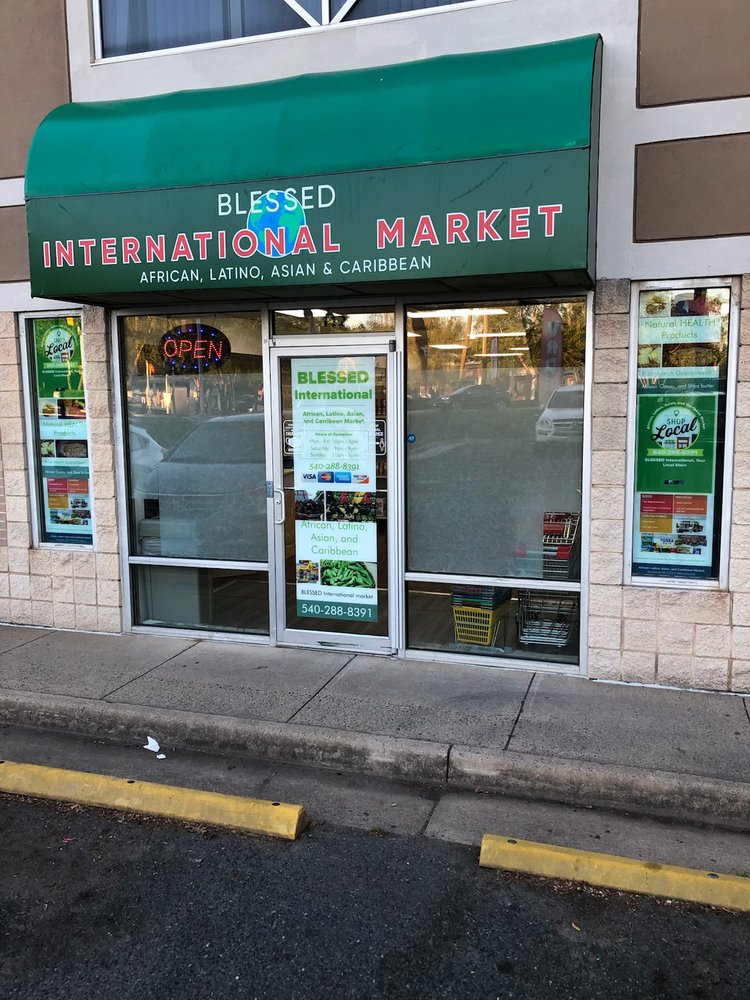 BLESSED International Market Logo
