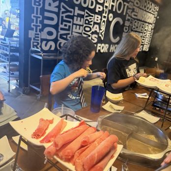 HOT C POT - Chef is chowing with loads of ribeye ready to drop in the hot pot - Hot Pot Near Me - Fountain Valley, California