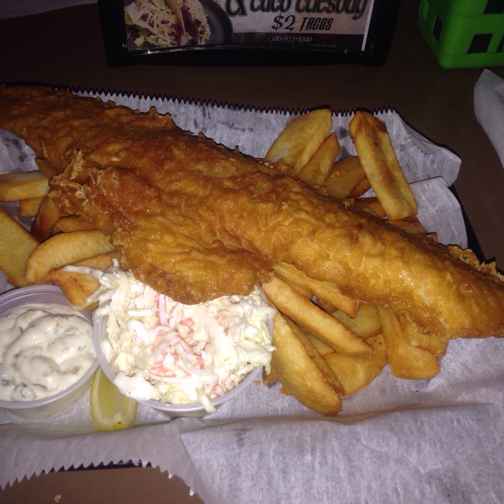 Fletcher's Irish Brewery & Scratch Kitchen - Haddock fish & chips. BAD! Extremely hard inedible breading. Taste like frozen fish. Bad cole slaw. - Irish Pub Near Me - Ormond Beach, Florida