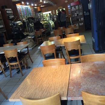 The Blue Strawberry Coffee Company - tables and chairs - Coffee Roasteries Near Me - Cedar Rapids, Iowa The Blue Strawberry Coffee Company - tables and chairs - Coffee Roasteries Near Me - Cedar Rapids, Iowa