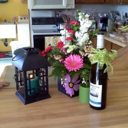 Lighthouse Florist & Wine Gallery - Gorgeous flower arrangement and a bottle of wine for mother's day.