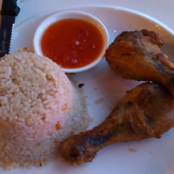 Spicy Shallot - Coconut rice with crispy chicken. Only two drumsticks for $9.00. - Thai Near Me - Elmhurst, New York Spicy Shallot - Coconut rice with crispy chicken. Only two drumsticks for $9.00. - Thai Near Me - Elmhurst, New York
