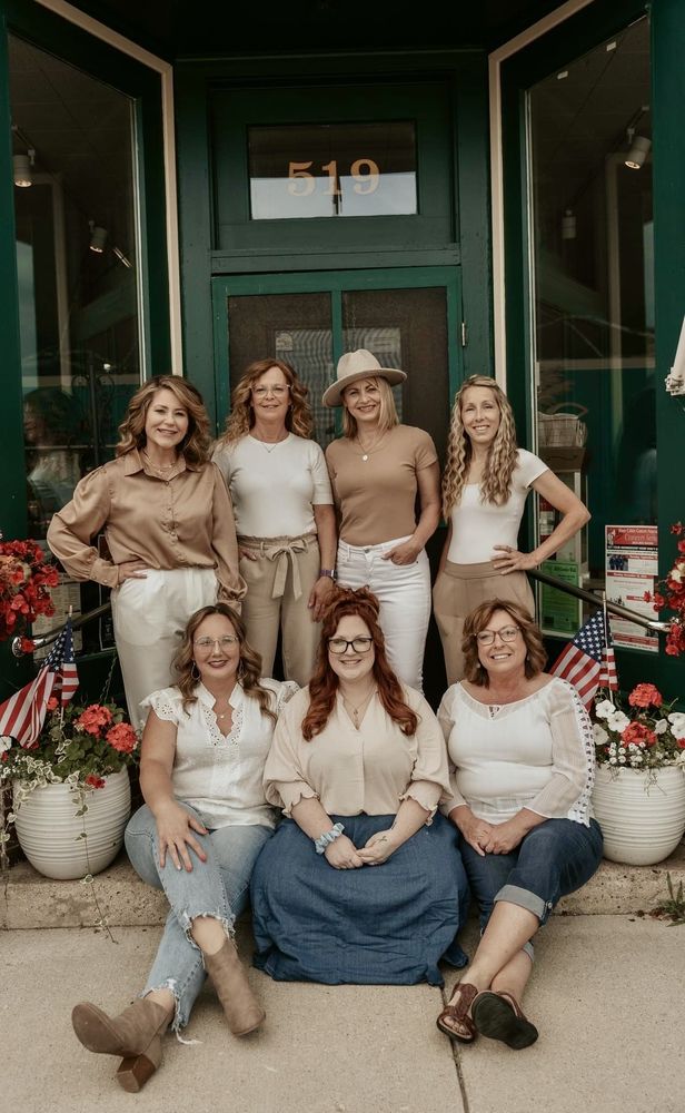 Intrigue Salon and Body Studio Logo