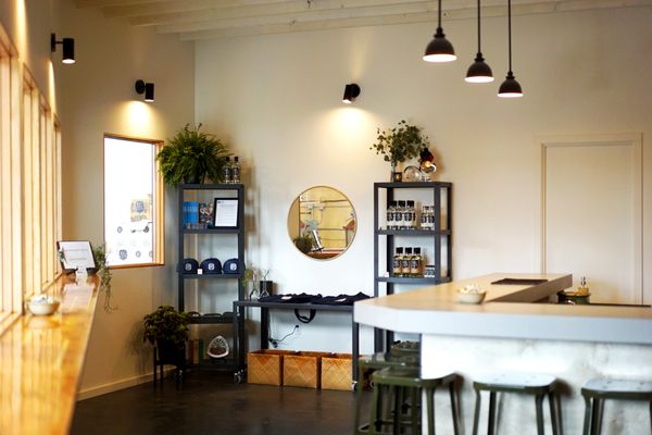 Photo of Greenhome Solutions - Seattle, WA, US. Caesarstone Raw Concrete Countertop + Juniper Butcher Block Counters @ Big Gin, Seattle WA