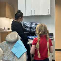 Taylor Dentistry, Russell T. Taylor DMD - Our wonderful dental hygienist talking to my 6 year old about her X-rays! I thought this was SO cool