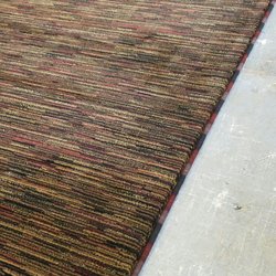 Specialty multicolor serging can add a unique and personal touch to your area rugs.