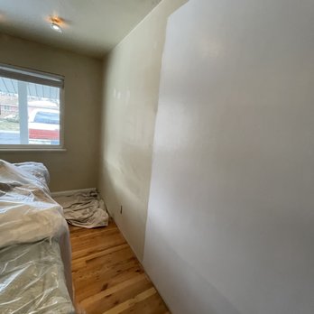 MGR Properties - a room with white walls and wood floors - Refinishing Services Near Me MGR Properties - a room with white walls and wood floors - Refinishing Services Near Me